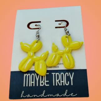 Balloon dog in lemon yellow
